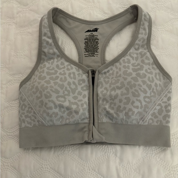 Avia front zip grey and white cheata print sports bra. Large.  NWOT - Picture 1 of 5